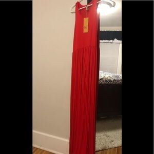 Pretty red dress I got for a wedding that never took place because of Covid